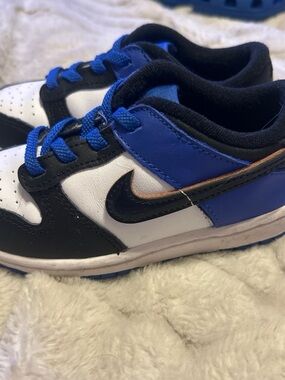 Nike Kids Blue Black White Low-Top Sneaker with Orange Accent